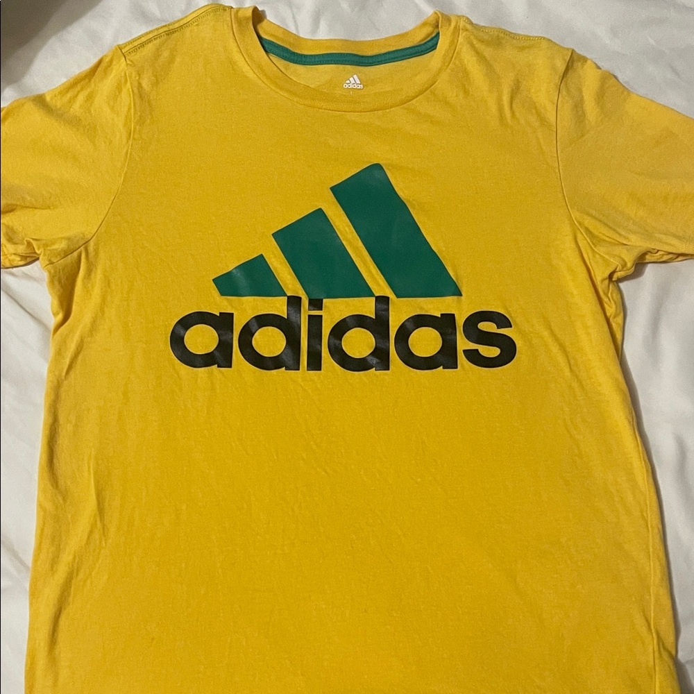 Boys size L Adidas Yellow Tee with Black and Green Logo